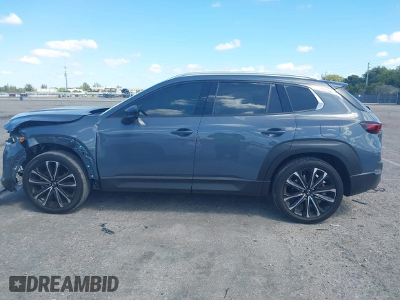 2024 Mazda CX-50 S Premium Plus z VIN 7MMVABEM4RN171943, wystawiony jako IAAI lot #41839219 z przebiegiem 13 733 mil mil oraz . Historia ofert i sprzedaży dostępna na DreamBid. Obrazek 15.