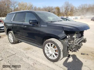2021 Chevrolet Tahoe High Country with VIN 1GNSCTKLXMR105453, listed as a Copart auction lot 82807274 with 56,534 mi miles and Salvage Title. Bid and sale history available at carsss.com. Image 4.