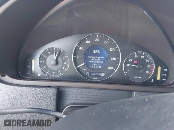 2004 Mercedes-Benz CLK-Class 5.0L with VIN WDBTJ75J14F095156, listed as a IAAI auction lot 41815605 with 176,902 mi miles. Bid and sale history available at carsss.com. Image 7.