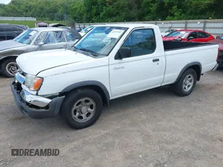 2000 Nissan Frontier XE z VIN 1N6DD21S4YC386902, wystawiony jako IAAI lot #42197752 z przebiegiem 164 055 mil mil oraz . Historia ofert i sprzedaży dostępna na DreamBid. Obrazek 2.