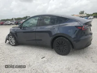 2024 Tesla Model Y Long Range с VIN 7SAYGDEE7RA279293, выставлен на аукционе Copart как лот 62758065 с пробегом 23 271 миль миль и Списание • Salvage title. История ставок и продаж доступна на DreamBid. Изображение 2.