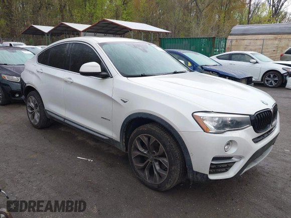2018 BMW X4 xDrive28i z VIN 5UXXW3C57J0T82081, wystawiony jako IAAI lot #41991254 z przebiegiem 100 654 mil mil oraz . Historia ofert i sprzedaży dostępna na DreamBid. Obrazek 1.
