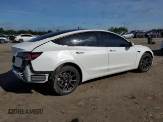 2023 Tesla Model 3 с VIN 5YJ3E1EA6PF427300, выставлен на аукционе Copart как лот 61457055 с пробегом 44 438 миль миль и Списание • Salvage title. История ставок и продаж доступна на DreamBid. Изображение 3.