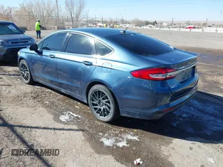 2018 Ford Fusion S with VIN 3FA6P0G77JR129224, listed as a IAAI auction lot 41483648 with 104,045 mi miles. Bid and sale history available at carsss.com. Image 3.
