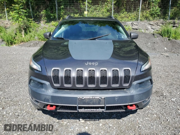 2015 Jeep Cherokee Trailhawk с VIN 1C4PJMBS3FW698997, выставлен на аукционе Copart как лот 63470875 с пробегом 107 535 миль миль и Списание • Salvage title. История ставок и продаж доступна на DreamBid. Изображение 5.