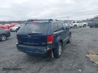 2005 Jeep Grand Cherokee Limited with VIN 1J4HR58275C703736, listed as a IAAI auction lot 41705850 with NaN miles. Bid and sale history available at carsss.com. Image 4.