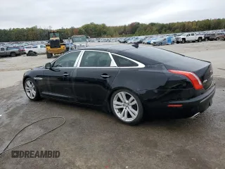 2013 Jaguar XJ with VIN SAJWA2GB7DLV40560, listed as a Copart auction lot 78228114 with 110,750 mi miles and Salvage Title. Bid and sale history available at carsss.com. Image 2.