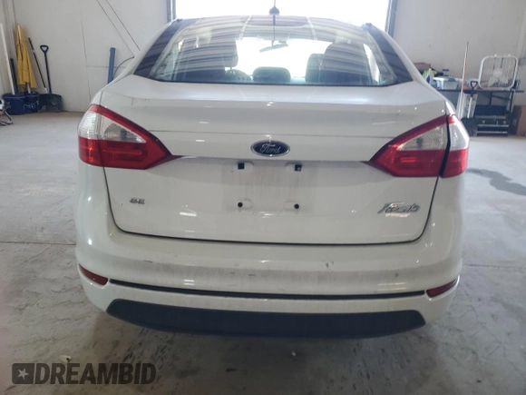2016 Ford Fiesta SE with VIN 3FADP4BJ4GM173821, listed as a Copart auction lot 48788195 with 54,686 mi miles and Salvage Title. Bid and sale history available at DreamBid. Image 6.