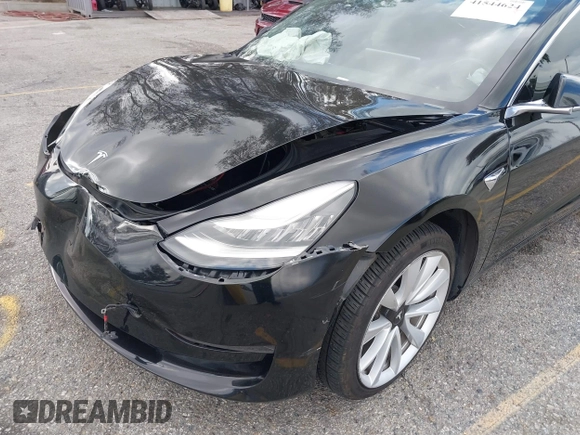 2018 Tesla Model 3 Long Range Battery with VIN 5YJ3E1EA9JF009384, listed as a IAAI auction lot 41544624 with 66,896 mi miles and . Bid and sale history available at DreamBid. Image 6.