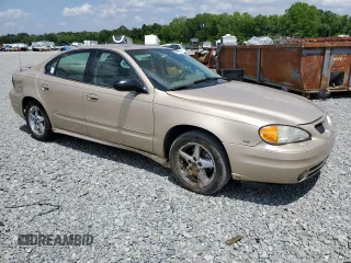 2004 Pontiac Grand Am SE1 with VIN 1G2NF52E74M568873, listed as a Copart auction lot 56187005 with 107,037 mi miles and Salvage title. Bid and sale history available at DreamBid. Image 4.