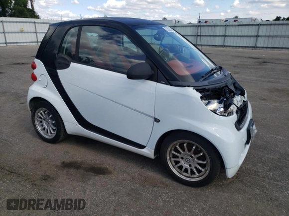 2011 Smart fortwo Pure with VIN WMEEJ3BAXBK447292, listed as a Copart auction lot 73308384 with 35,166 mi miles and Salvage title. Bid and sale history available at DreamBid. Image 4.