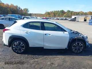 2021 Lexus UX with VIN JTHP9JBH5M2053797, listed as a IAAI auction lot 40718103 with 57,366 mi miles. Bid and sale history available at carsss.com. Image 14.