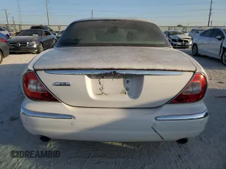 2004 Jaguar XJ with VIN SAJWA71CX4SG21334, listed as a Copart auction lot 70946034 with 0 mi miles and Clean Title. Bid and sale history available at carsss.com. Image 6.