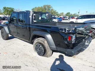 2024 Jeep Gladiator Sport S with VIN 1C6HJTAG6RL111586, listed as a IAAI auction lot 41833397 with 2,452 mi miles. Bid and sale history available at carsss.com. Image 3.