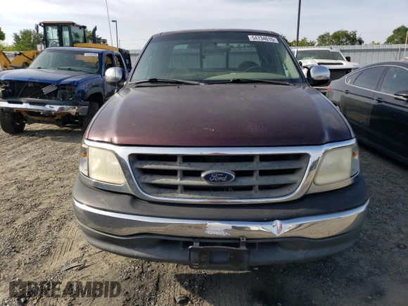 2000 Ford F-150 with VIN 1FTRX17W5YKA50203, listed as a Copart auction lot 54734615 with Not Provided miles and Salvage Title. Bid and sale history available at DreamBid. Image 5.