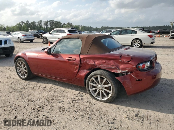 2007 Mazda MX-5 Miata Sport z VIN JM1NC25F270127574, wystawiony jako Copart lot #51538215 z przebiegiem 131 339 mil mil oraz Szkoda całkowita • Salvage title. Historia ofert i sprzedaży dostępna na DreamBid. Obrazek 2.