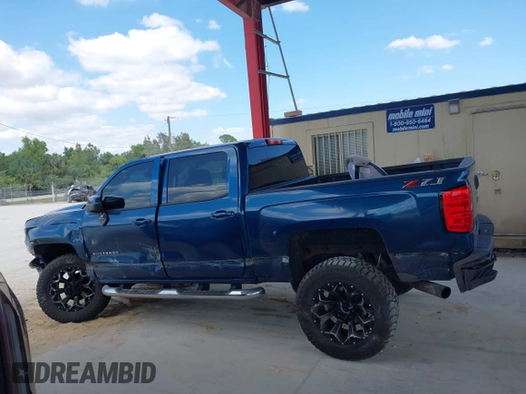 2018 Chevrolet Silverado 1500 LT with VIN 3GCUKREC0JG366590, listed as a IAAI auction lot 42045634 with 92,989 mi miles. Bid and sale history available at carsss.com. Image 14.