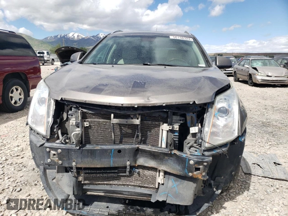 2012 Cadillac SRX Performance Collection with VIN 3GYFNEE34CS589833, listed as a Copart auction lot 56138324 with Not provided miles and Salvage title. Bid and sale history available at DreamBid. Image 5.