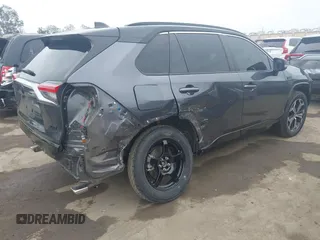 2021 Toyota RAV4 XSE with VIN JTMFB3FV7MD009432, listed as a IAAI auction lot 42439466 with 91,544 mi miles and . Bid and sale history available at DreamBid. Image 4.