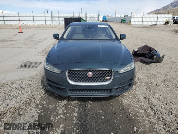 2017 Jaguar XE 35t Prestige with VIN SAJAK4BV2HA974312, listed as a Copart auction lot 51285455 with 99,910 mi miles and Salvage Title. Bid and sale history available at DreamBid. Image 5.