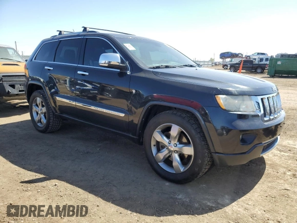 2011 Jeep Grand Cherokee Overland with VIN 1J4RR6GT4BC541497, listed as a Copart auction lot 52121595 with 143,010 mi miles and Clean title. Bid and sale history available at DreamBid. Image 4.