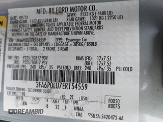 2014 Ford Fusion SE Hybrid with VIN 3FA6P0LU7ER154559, listed as a IAAI auction lot 42198548 with 244,630 mi miles. Bid and sale history available at carsss.com. Image 9.