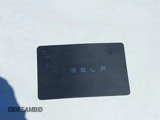 2018 Tesla Model 3 Long Range Battery z VIN 5YJ3E1EB8JF105886, wystawiony jako IAAI lot #42268190 z przebiegiem 80 917 mil mil oraz . Historia ofert i sprzedaży dostępna na DreamBid. Obrazek 11.