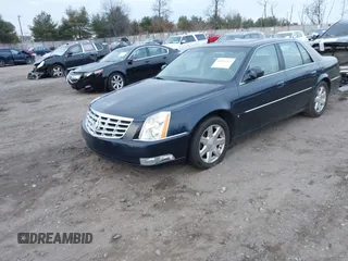 2007 Cadillac DTS Luxury I with VIN 1G6KD57Y37U139647, listed as a IAAI auction lot 41015563 with 96,275 mi miles and . Bid and sale history available at DreamBid. Image 2.