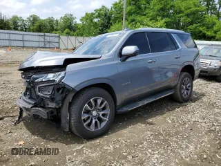 2021 Chevrolet Tahoe LT with VIN 1GNSKNKD2MR255144, listed as a Copart auction lot 61586255 with 76,939 mi miles and Salvage title. Bid and sale history available at DreamBid. Image 1.
