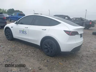 2024 Tesla Model Y with VIN 7SAYGDED9RA331840, listed as a IAAI auction lot 42350926 with 13,818 mi miles and . Bid and sale history available at DreamBid. Image 3.
