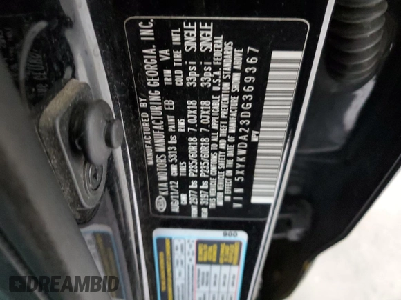 2013 Kia Sorento SX z VIN 5XYKWDA23DG369367, wystawiony jako Copart lot #57721075 z przebiegiem 133 560 mil mil oraz Szkoda całkowita • Salvage title. Historia ofert i sprzedaży dostępna na DreamBid. Obrazek 13.