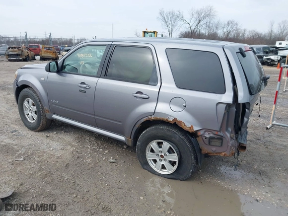 2008 Mercury Mariner with VIN 4M2CU91118KJ13477, listed as a IAAI auction lot 41987552 with 130,238 mi miles. Bid and sale history available at carsss.com. Image 3.