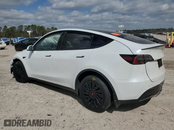 2024 Tesla Model Y Long Range with VIN 7SAYGDEE2RA335818, listed as a Copart auction lot 48821475 with 4,415 mi miles and Salvage Title. Bid and sale history available at DreamBid. Image 2.