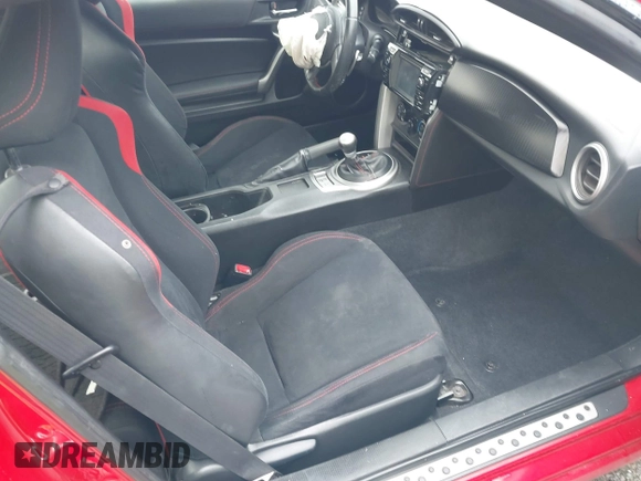 2014 Scion FR-S z VIN JF1ZNAA17E8702482, wystawiony jako IAAI lot #41582768 z przebiegiem 117 193 mil mil oraz . Historia ofert i sprzedaży dostępna na DreamBid. Obrazek 5.