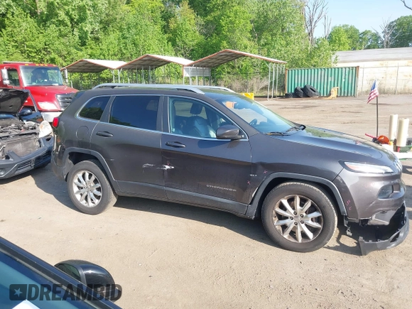 2015 Jeep Cherokee Limited with VIN 1C4PJMDB4FW610956, listed as a IAAI auction lot 42167270 with 118,219 mi miles and . Bid and sale history available at DreamBid. Image 13.
