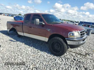 1998 Ford F-150 with VIN 1FTZX1763WNC22708, listed as a Copart auction lot 56914515 with 179,011 mi miles and Salvage title. Bid and sale history available at DreamBid. Image 4.