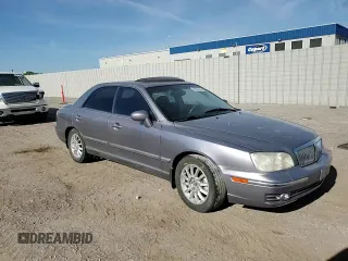2005 Hyundai XG z VIN KMHFU45E05A425533, wystawiony jako Copart lot #59055494 z przebiegiem 157 456 mil mil oraz Szkoda całkowita • Salvage title. Historia ofert i sprzedaży dostępna na DreamBid. Obrazek 10.