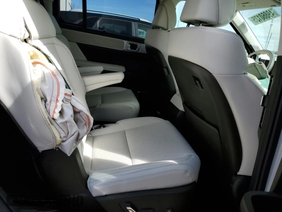 2025 Hyundai Santa Fe Calligraphy z VIN 5NMP54GL8SH116265, wystawiony jako Copart lot #49860135 z przebiegiem 1 089 mil mil oraz Szkoda całkowita • Salvage title. Historia ofert i sprzedaży dostępna na DreamBid. Obrazek 11.