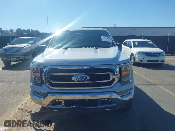 2021 Ford F-150 XL with VIN 1FTFW1E84MKD19960, listed as a IAAI auction lot 41734606 with 48,141 mi miles. Bid and sale history available at carsss.com. Image 12.