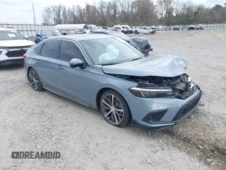 2023 Honda Civic Touring z VIN 2HGFE1F95PH325015, wystawiony jako IAAI lot #41796024 z przebiegiem 39 333 mil mil oraz . Historia ofert i sprzedaży dostępna na DreamBid. Obrazek 1.