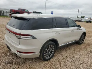2021 Lincoln Aviator Reserve z VIN 5LM5J7XCXMGL19293, wystawiony jako Copart lot #64761565 z przebiegiem 61 614 mil mil oraz Szkoda całkowita • Salvage title. Historia ofert i sprzedaży dostępna na DreamBid. Obrazek 3.