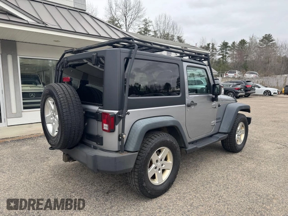 2013 Jeep Wrangler Sport with VIN 1C4AJWAG7DL605881, listed as a Copart auction lot 53525105 with 214,662 mi miles and Clean Title. Bid and sale history available at carsss.com. Image 4.