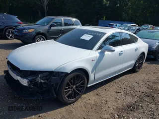 2016 Audi A7 3.0 Premium Plus with VIN WAUWGAFC4GN017486, listed as a IAAI auction lot 40057097 with 85,937 mi miles. Bid and sale history available at carsss.com. Image 18.
