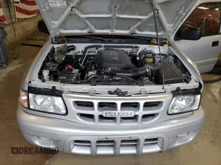 2000 Isuzu Rodeo z VIN 4S2DM58WXY4346884, wystawiony jako Copart lot #43108675 z przebiegiem 144 306 mil mil oraz Nie do naprawy. Historia ofert i sprzedaży dostępna na DreamBid. Obrazek 14.