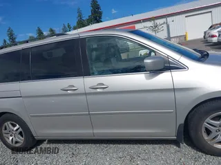 2006 Honda Odyssey EX-L z VIN 5FNRL38726B428227, wystawiony jako IAAI lot #42381464 z przebiegiem 156 623 mil mil oraz . Historia ofert i sprzedaży dostępna na DreamBid. Obrazek 14.