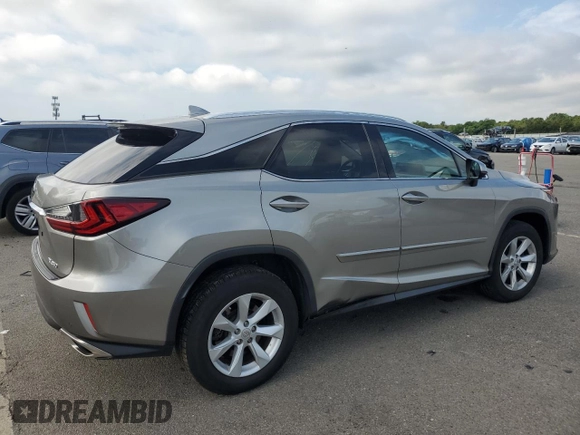 2017 Lexus RX 350 with VIN 2T2BZMCA2HC114007, listed as a Copart auction lot 63587985 with 61,421 mi miles and Salvage title. Bid and sale history available at DreamBid. Image 3.