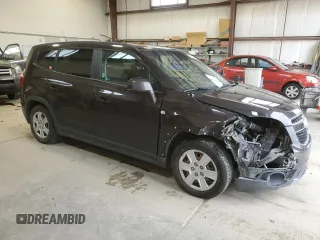2013 Chevrolet Orlando z VIN KL77P2ET7DK121513, wystawiony jako Copart lot #46908545 z przebiegiem 154 330 mil mil oraz Szkody całkowita. Historia ofert i sprzedaży dostępna na DreamBid. Obrazek 4.