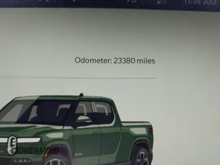 2023 Rivian R1T Adventure z VIN 7FCTGAAAXPN019894, wystawiony jako IAAI lot #42168226 z przebiegiem 23 380 mil mil oraz . Historia ofert i sprzedaży dostępna na DreamBid. Obrazek 7.