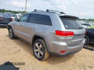 2014 Jeep Grand Cherokee Limited with VIN 1C4RJFBG9EC210507, listed as a IAAI auction lot 42428788 with 141,147 mi miles and . Bid and sale history available at DreamBid. Image 3.