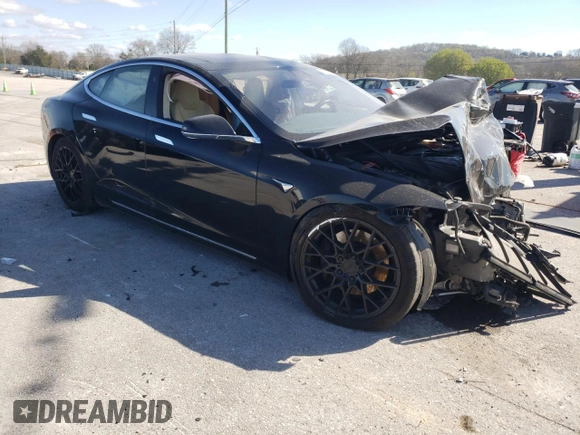2016 Tesla Model S 90D with VIN 5YJSA1E26GF168260, listed as a Copart auction lot 48703154 with 90,567 mi miles and Salvage Title. Bid and sale history available at DreamBid. Image 4.